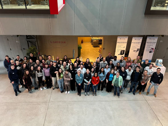 Group of BPMII attendees and sponsors posing for a photo